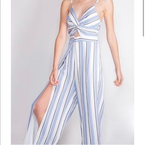 Blue striped jumpsuit with tie back